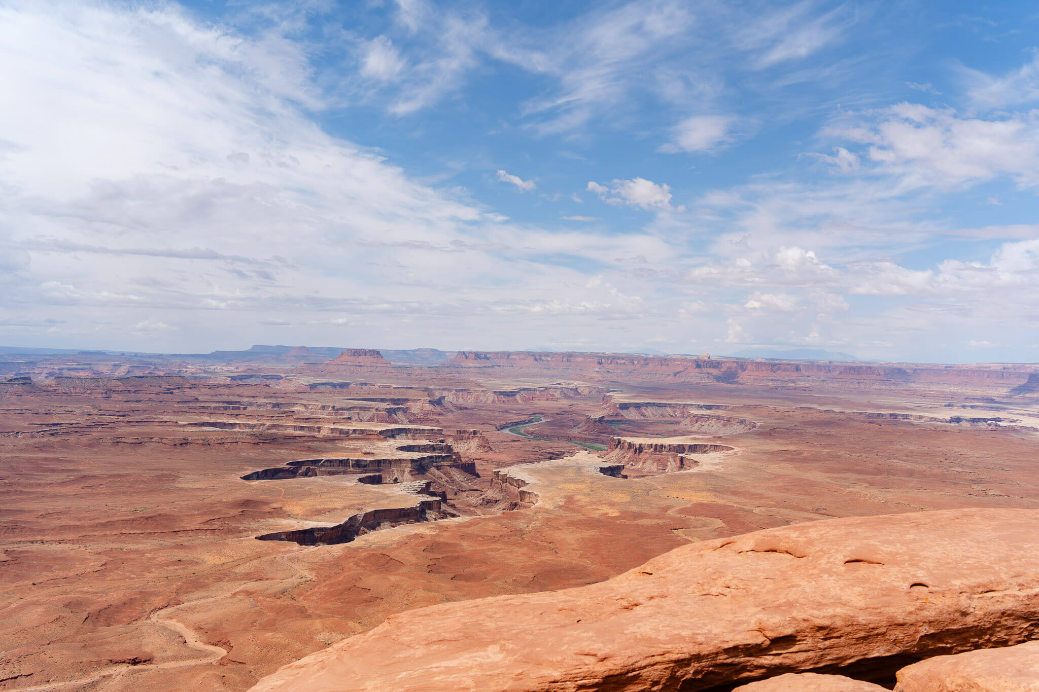 A look at canyons from the upper rim of a desert canyon offering a perfect spot for a Canyonlands Elopement