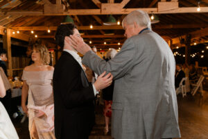 grooms grandpa giving him advice
