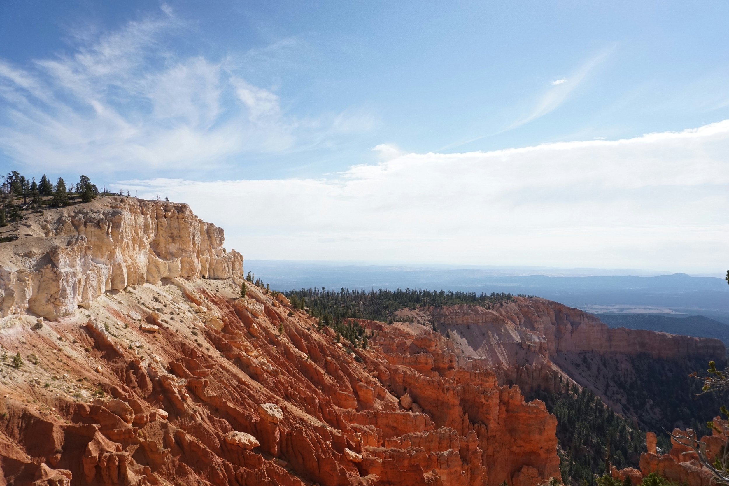 A look ffrom the top of a canyon wall overlooking mountains for a stunning Bryce Canyon National Park Elopement