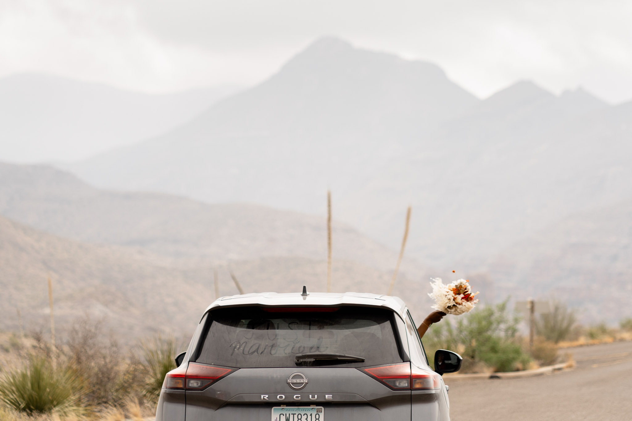 Elopement Ideas: write something fun on your get away vehicle 