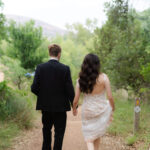 Blue hour light illuminating couple on Enchanted Rock trail