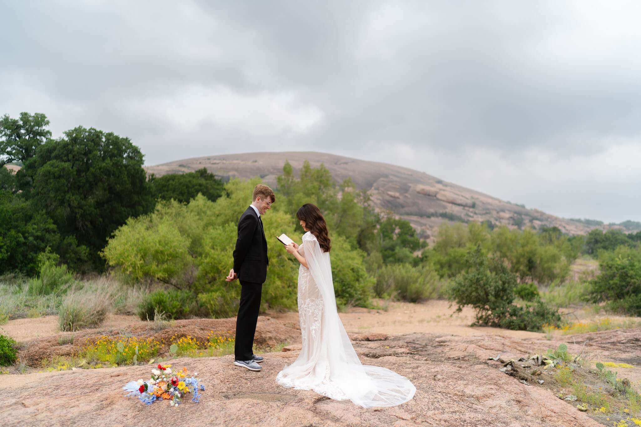 Intimate elopement ceremony on a secluded trail at Enchanted Rock State Park