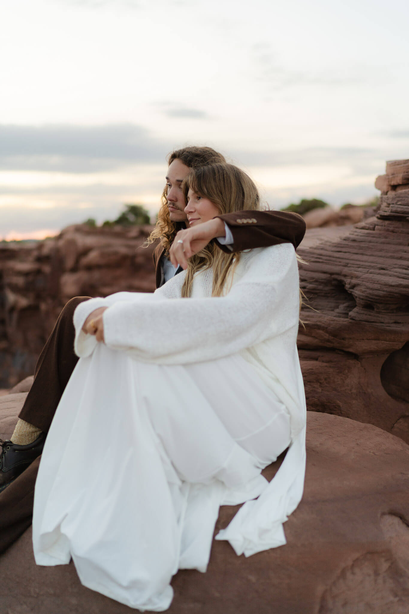 Couple enjoying the sunset in Moab