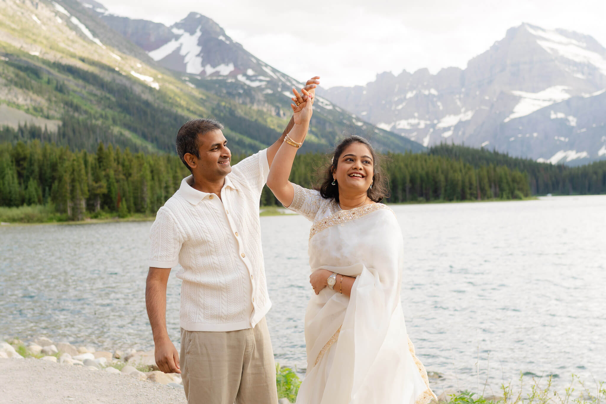 Couple dancing at one of the many beautiful Glacier National Park elopement locations.