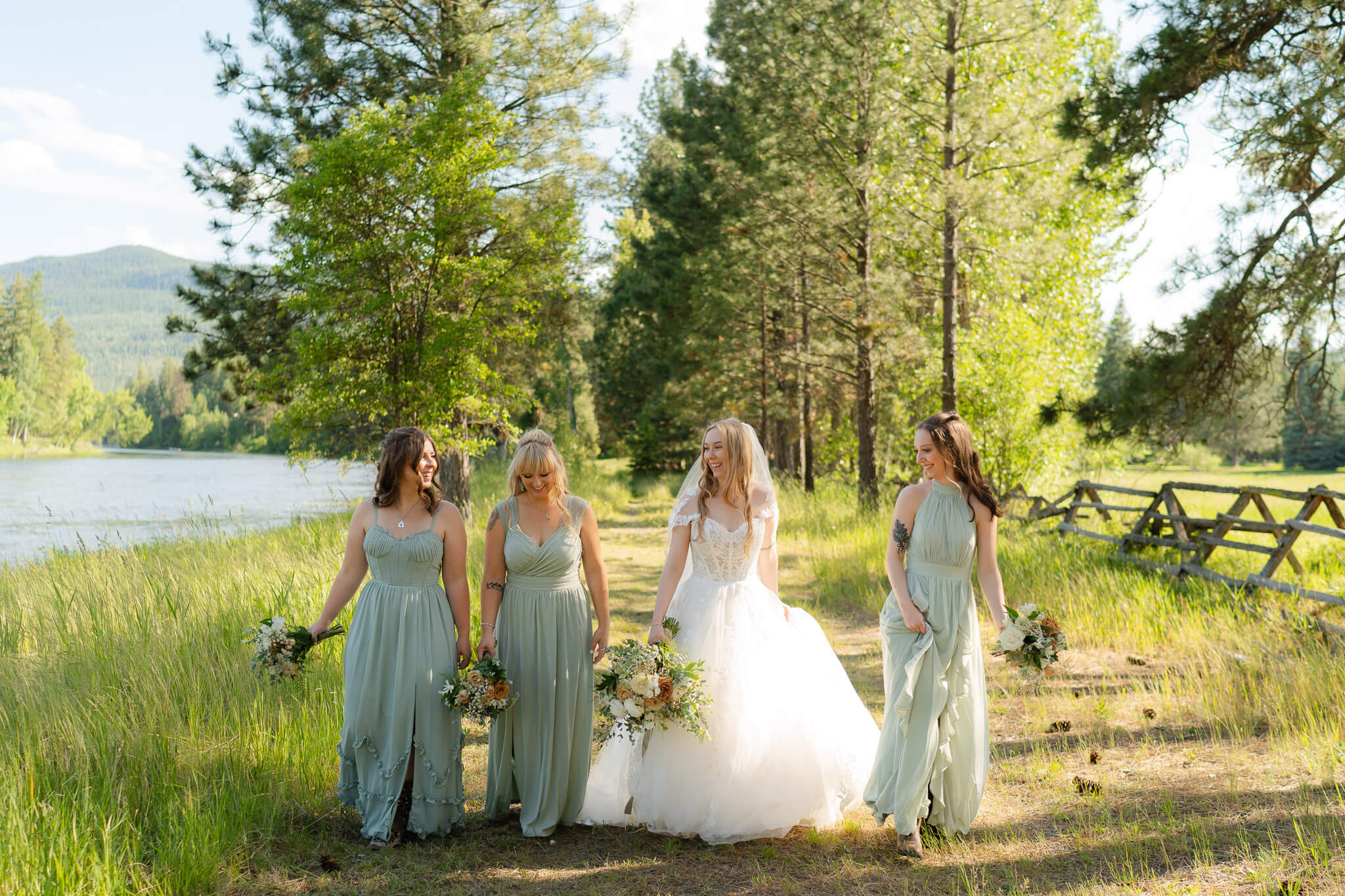 Bride and her bridesmaids have fun during portraits