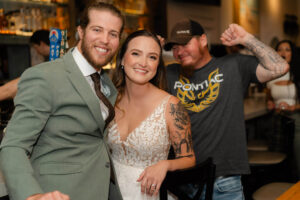 A stranger congratulated them with a shot at the bar!