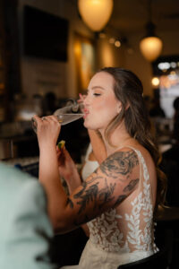 A stranger congratulated them with a shot at the bar!