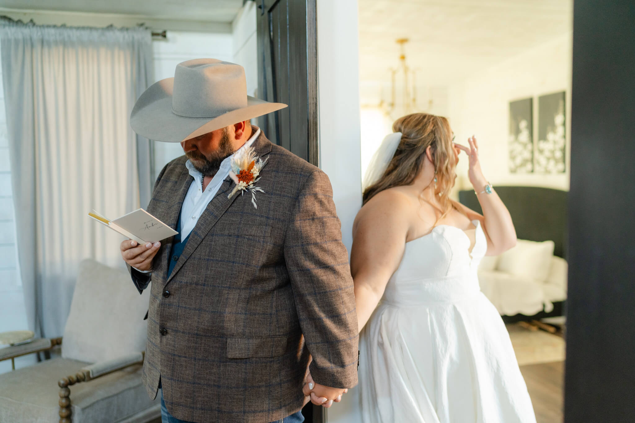 bride and groom standing in the getting ready suite at a Texas Hill Country Wedding venue sharing their private vows