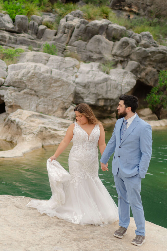 bride and groom after they elope in texas in Pedernales Falls State Park