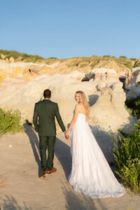 happy couple walks through the Paint mines